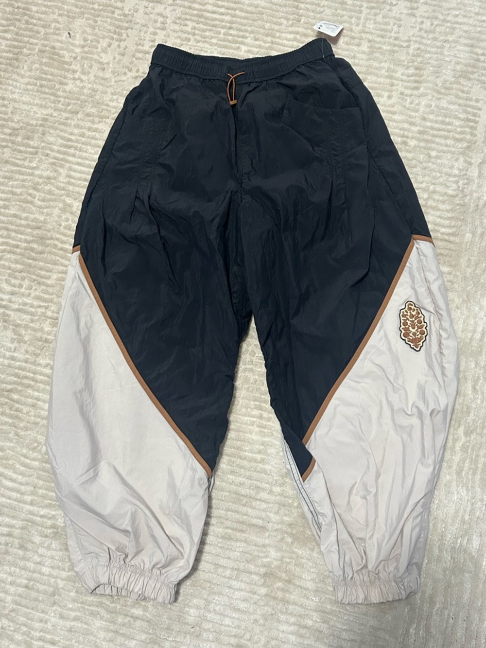 FP Movement by Free People Black and White Colorblock Joggers with Tan Piping